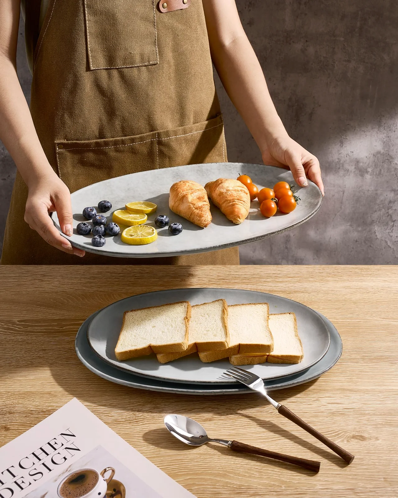 The middle platter of the set of three, carried in one hand
