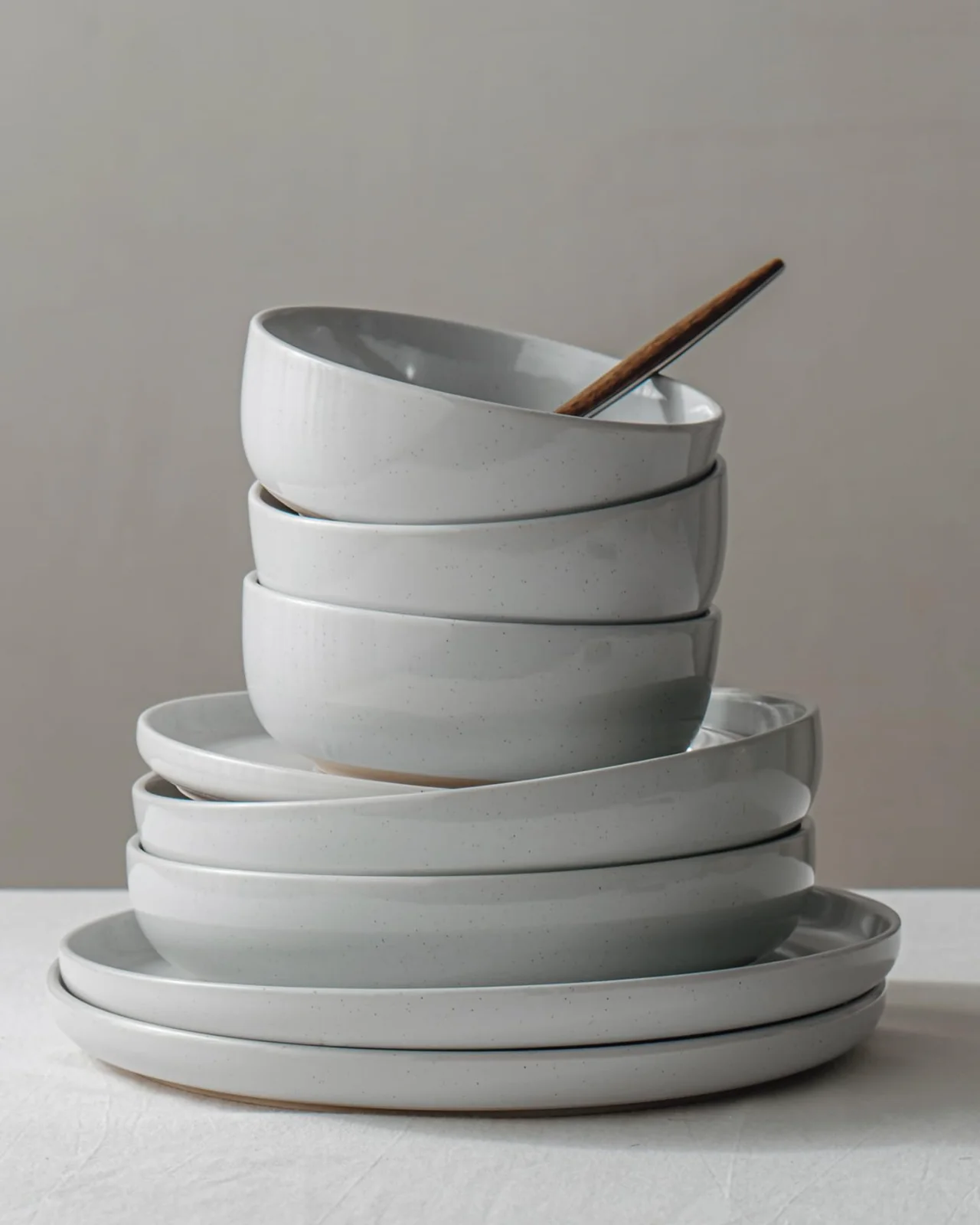 Plates and bowls stacked two high, as they should be